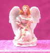 ANGEL KNEELING WITH ROSE