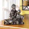 A MOTHER TEACHES FIGURINE (ZFL07-34349)