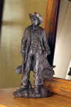 COWBOY WITH RIFLE AND SADDLE FIG (ZFL07-37168)