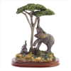 ELEPHANT AT TREE FIGURINE (WFM-38351)